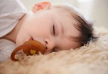 is it ok to let baby sleep with stuffy nose