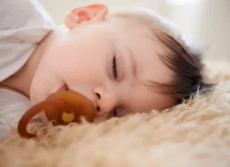 is it ok to let baby sleep with stuffy nose